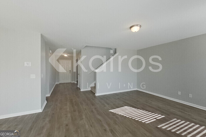 101 St Matthew Way Springfield, GA 31329 - Photo 11 of 30 a view of a room with wooden floor and white walls