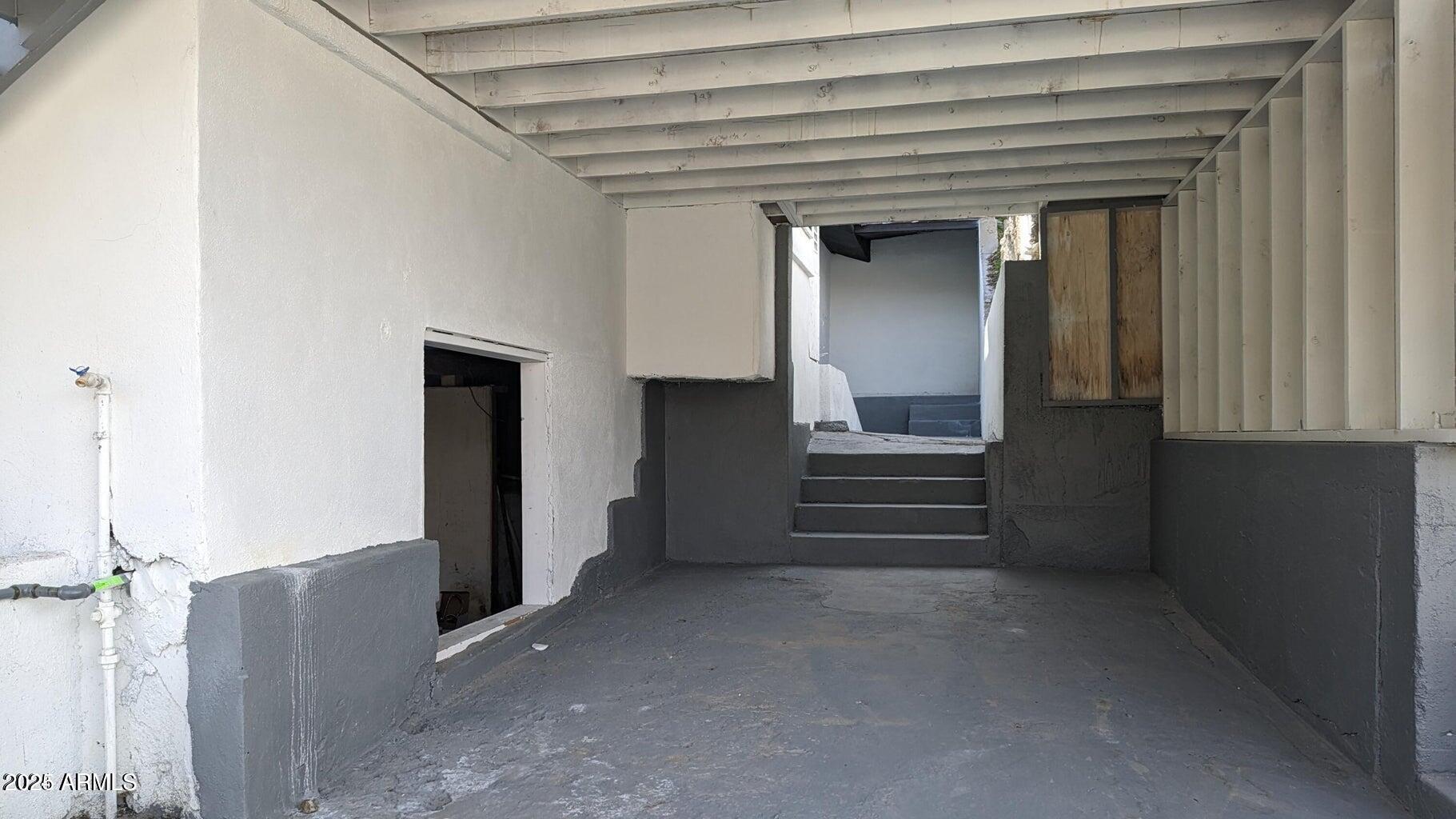 224 South Adonis Avenue Miami, AZ 85539 - Photo 13 of 13 a view of entryway and hall with a wooden floor