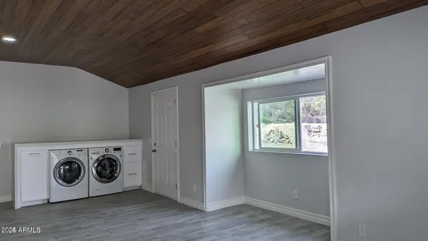 a utility room with dryer and washer