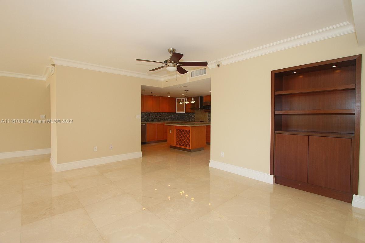 650 Ocean Drive, Unit 3C Key Biscayne, FL 33149 - Photo 3 of 16 an empty room with closet and windows