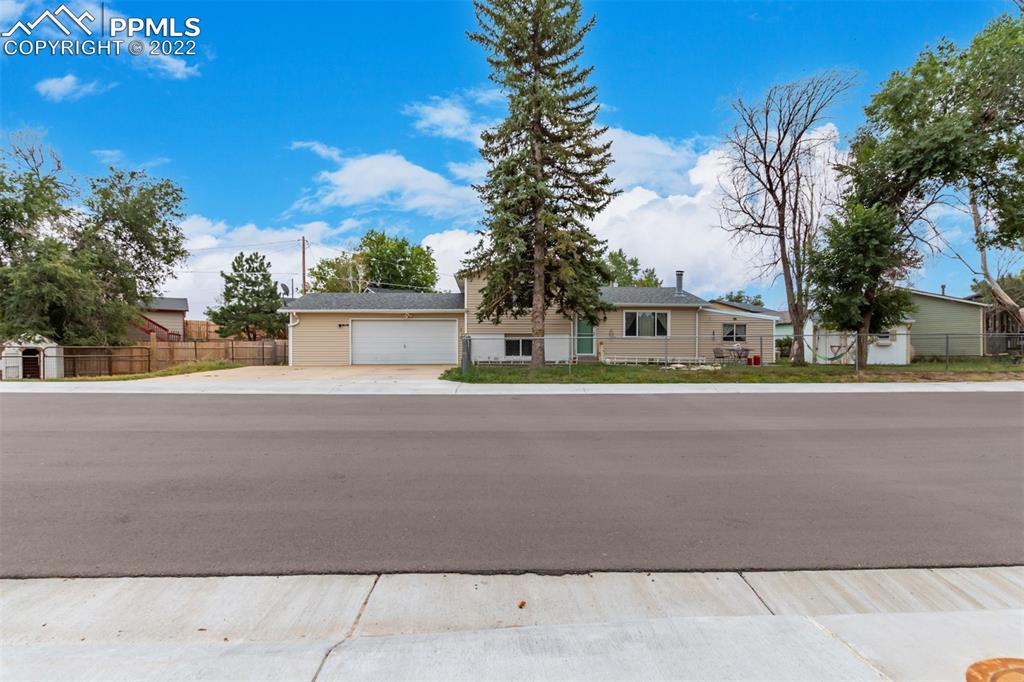 a view of street along with trees