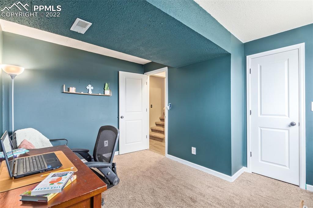 732 South Chestnut Street Elizabeth, CO 80107 - Photo 18 of 26 a view of workspace with lounge chair