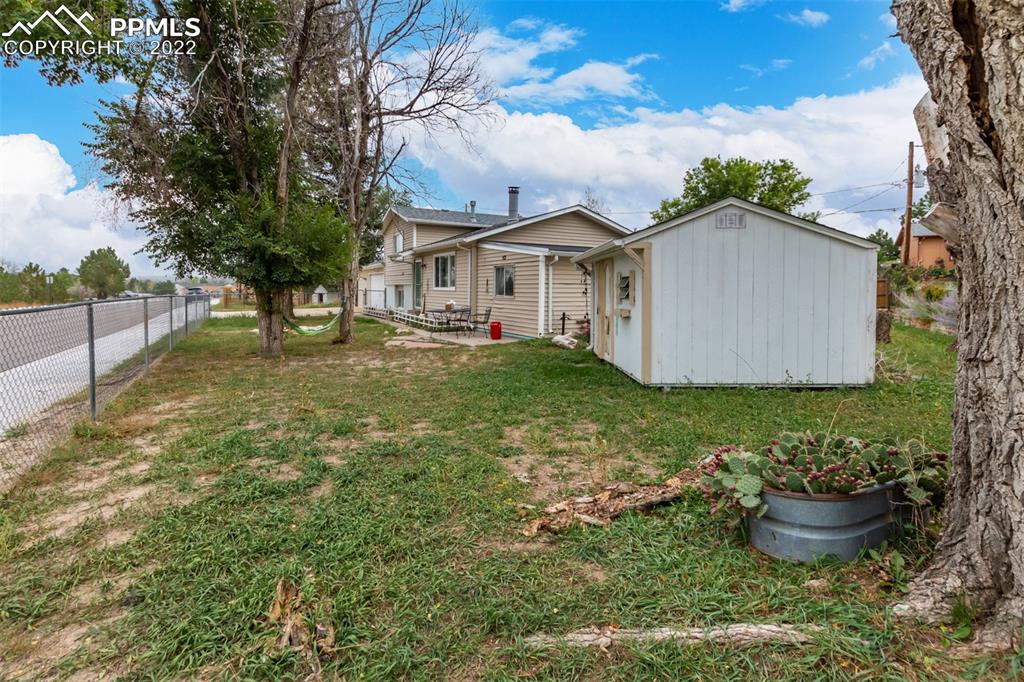 732 South Chestnut Street Elizabeth, CO 80107 - Photo 26 of 26 a front view of house with yard and green space