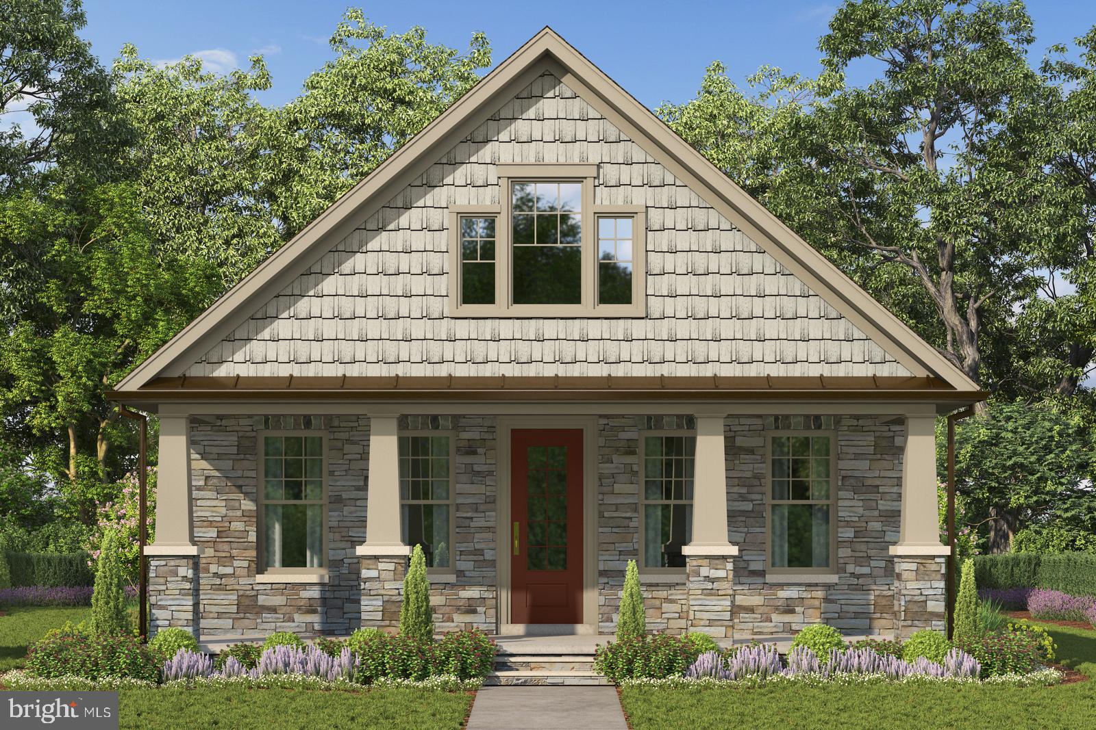 1 Mayapple Lane Frederick, MD 21702 - Photo 1 of 18 a front view of a house with garden