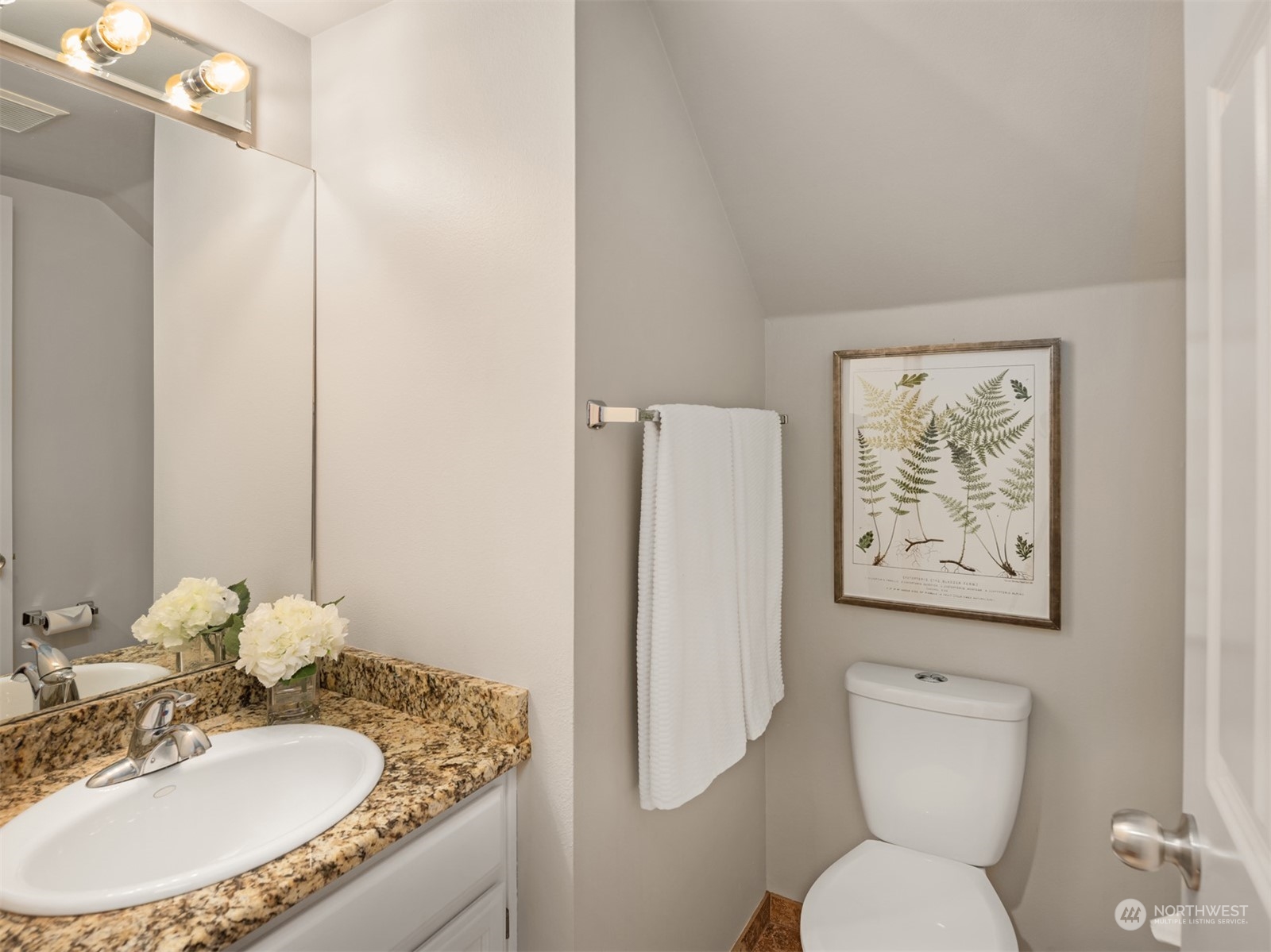 8722 Bowdoin Way Edmonds, WA 98026 - Photo 17 of 40 a bathroom with a toilet sink and mirror