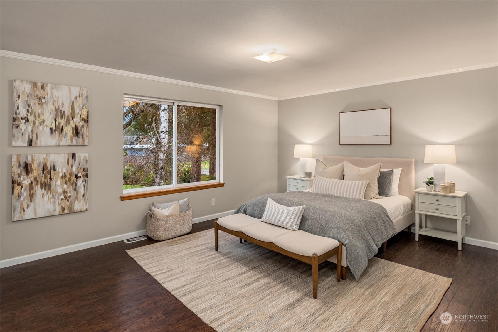 8722 Bowdoin Way Edmonds, WA 98026 - Photo 18 of 40 a spacious bedroom with a bed and a large window