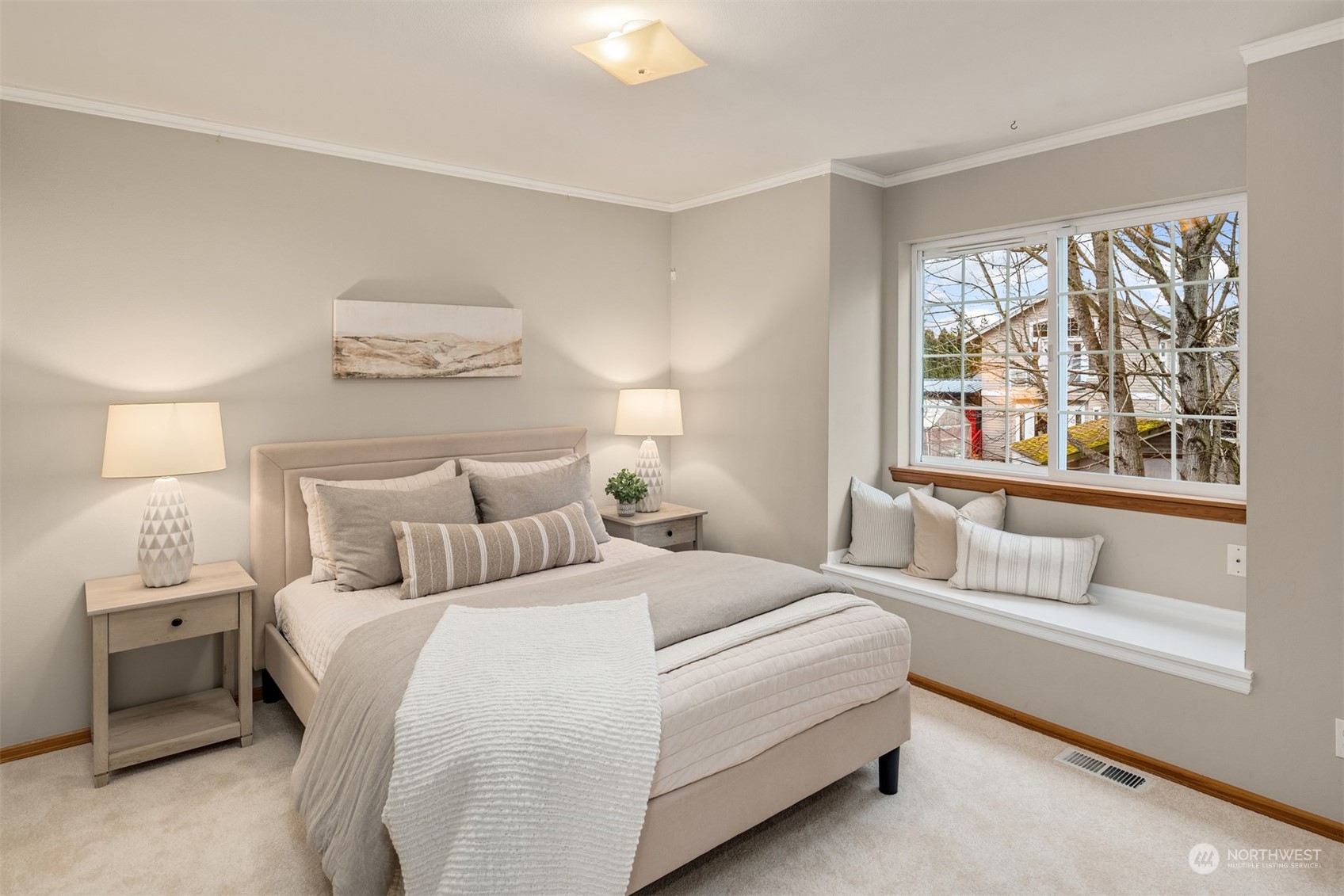 8722 Bowdoin Way Edmonds, WA 98026 - Photo 21 of 40 a bedroom with a bed and a large window