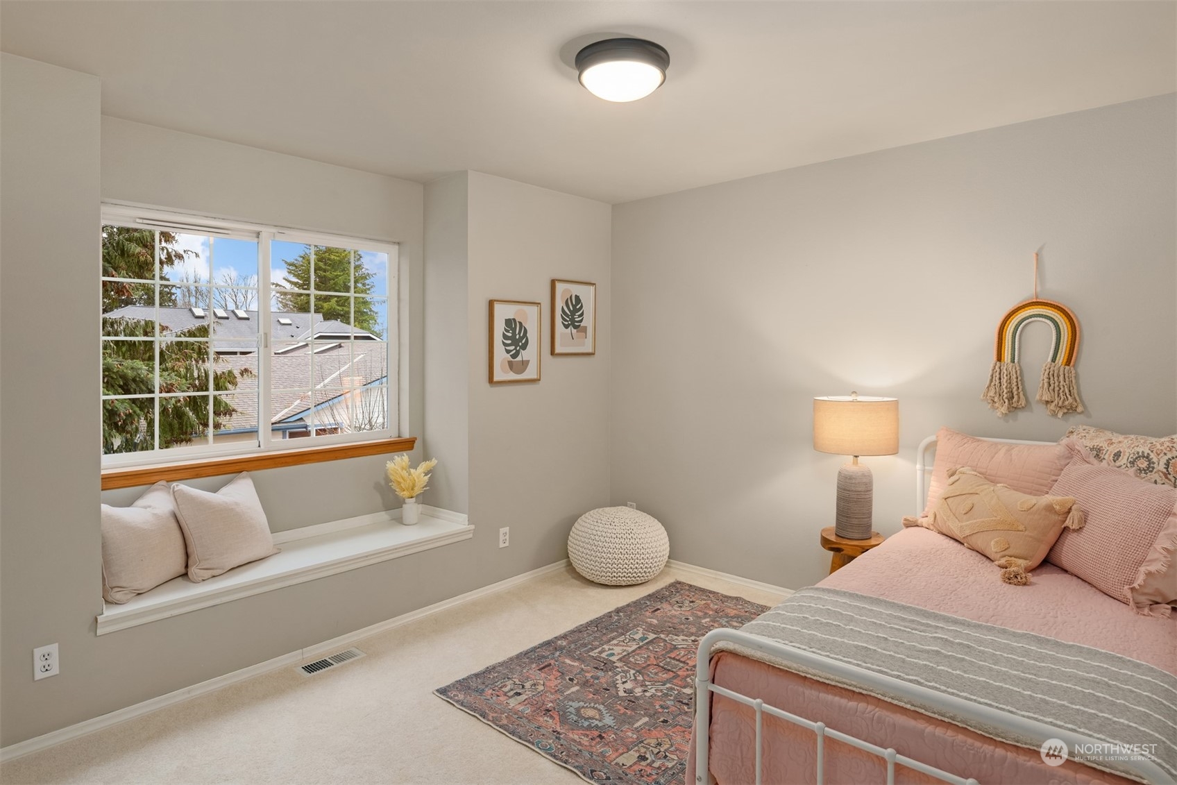 8722 Bowdoin Way Edmonds, WA 98026 - Photo 22 of 40 a bedroom with a bed and window