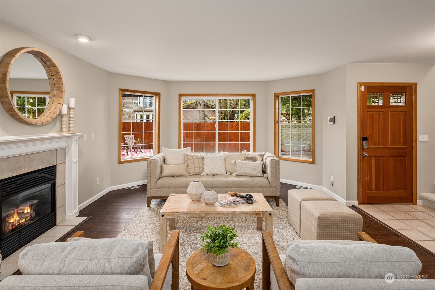8722 Bowdoin Way Edmonds, WA 98026 - Photo 5 of 40 a living room with furniture and a fireplace