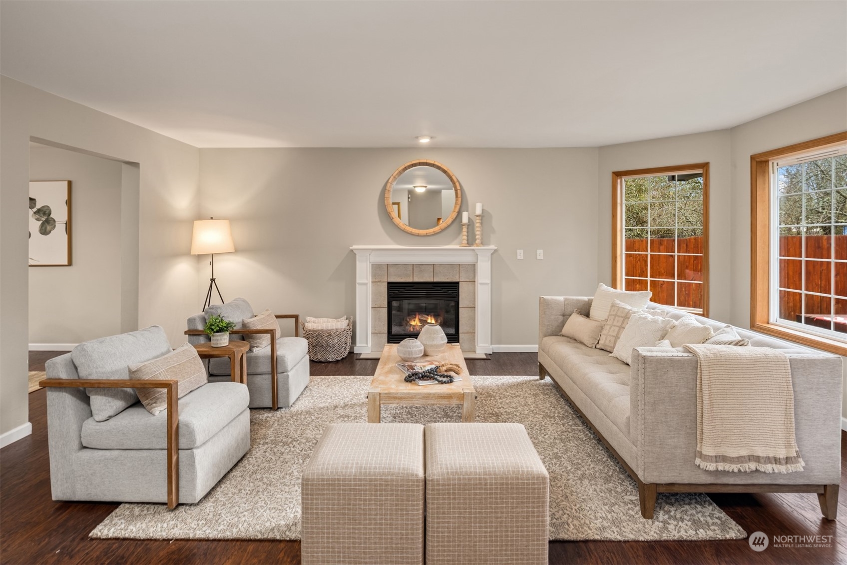 8722 Bowdoin Way Edmonds, WA 98026 - Photo 7 of 40 a living room with furniture and a fireplace