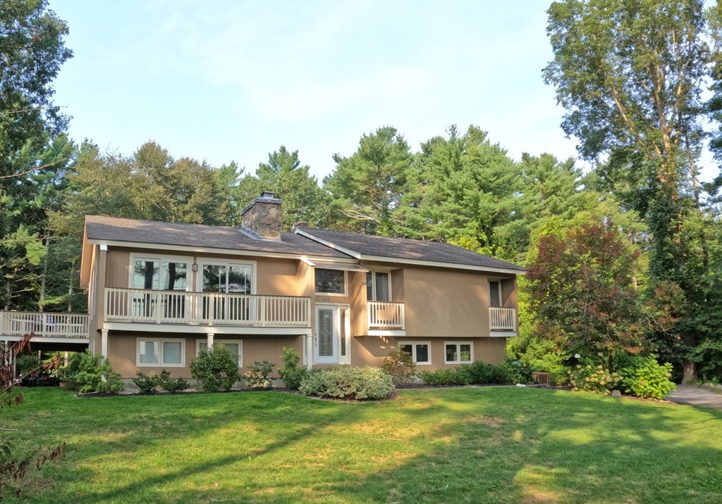 262 Flag Swamp Road Dartmouth, MA 02747 - Photo 1 of 23 a view of a house with a yard