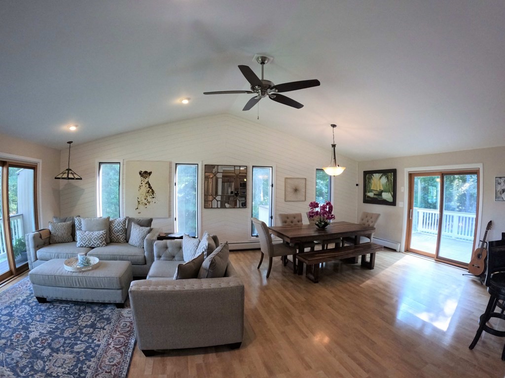 262 Flag Swamp Road Dartmouth, MA 02747 - Photo 12 of 23 a living room with furniture and a large window