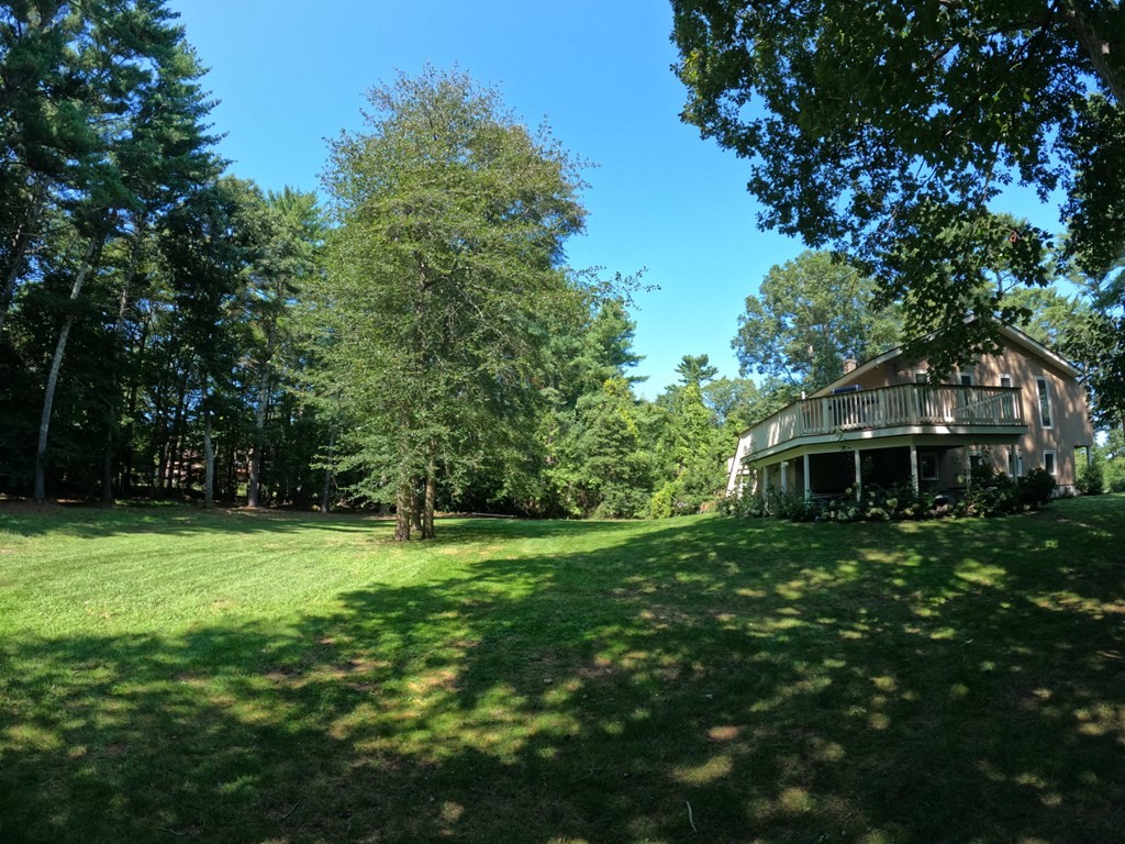 262 Flag Swamp Road Dartmouth, MA 02747 - Photo 2 of 23 a view of a house with a yard