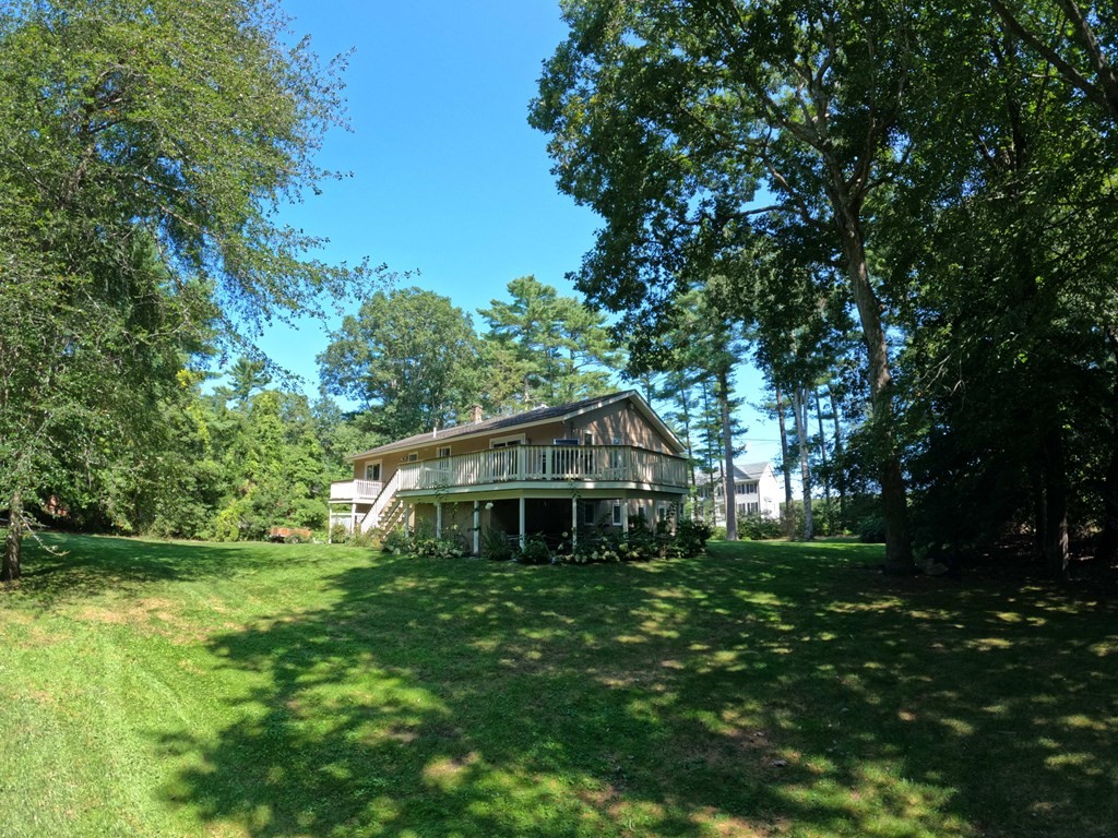 262 Flag Swamp Road Dartmouth, MA 02747 - Photo 4 of 23 a front view of house with yard and green space