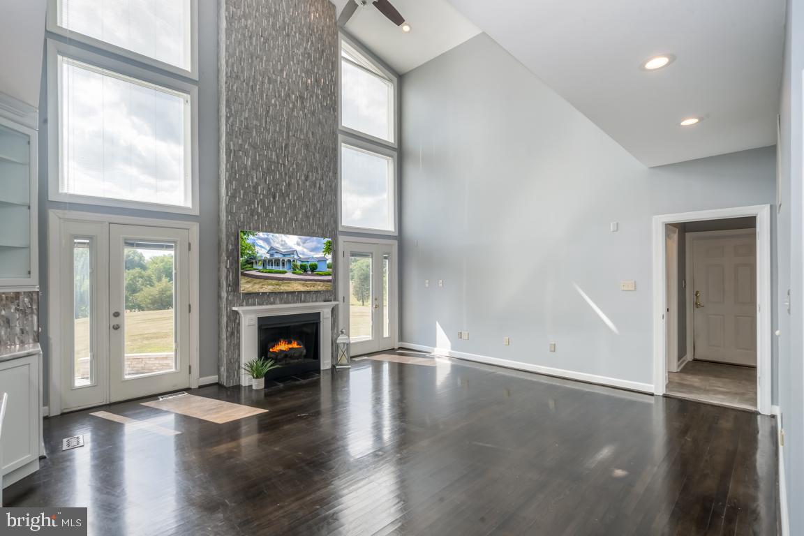 22669 Watson Road Leesburg, VA 20175 - Photo 10 of 46 Family Room With Volume Ceilings and Fireplace