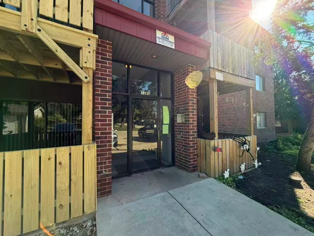 a view of a building with a porch