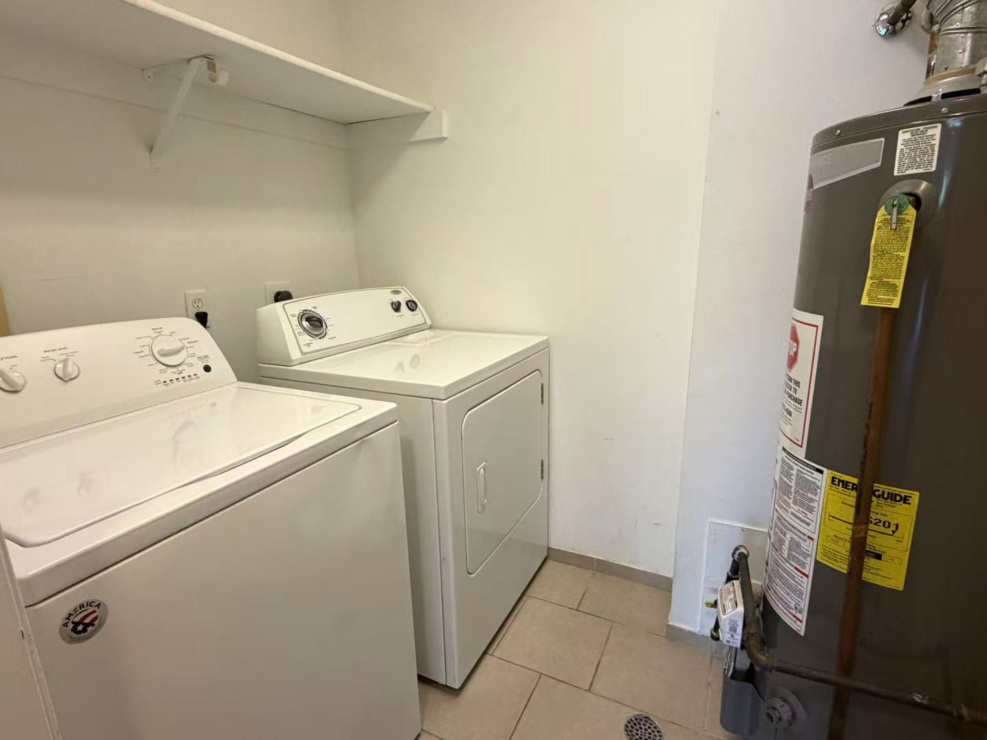 1360 Brook Street, Unit F St. Charles, IL 60174 - Photo 7 of 18 a utility room with dryer and washer
