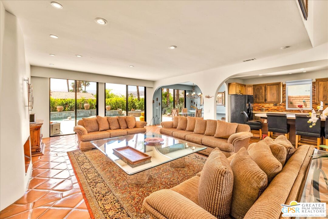 71121 Sunny Lane Rancho Mirage, CA 92270 - Photo 17 of 75 a living room with furniture and a large window
