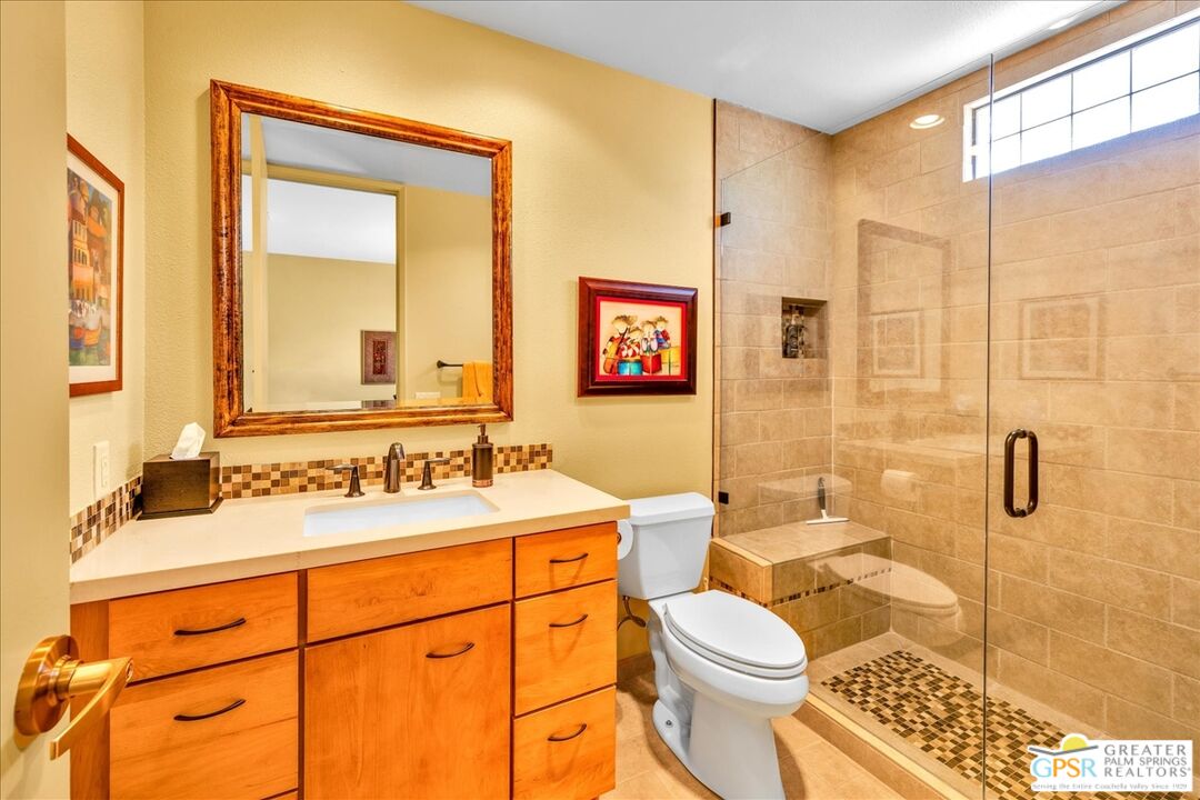 71121 Sunny Lane Rancho Mirage, CA 92270 - Photo 39 of 75 a bathroom with a sink a toilet and shower