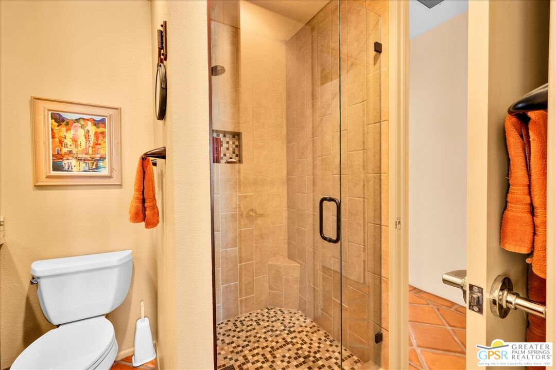 71121 Sunny Lane Rancho Mirage, CA 92270 - Photo 44 of 75 a bathroom with a toilet and shower