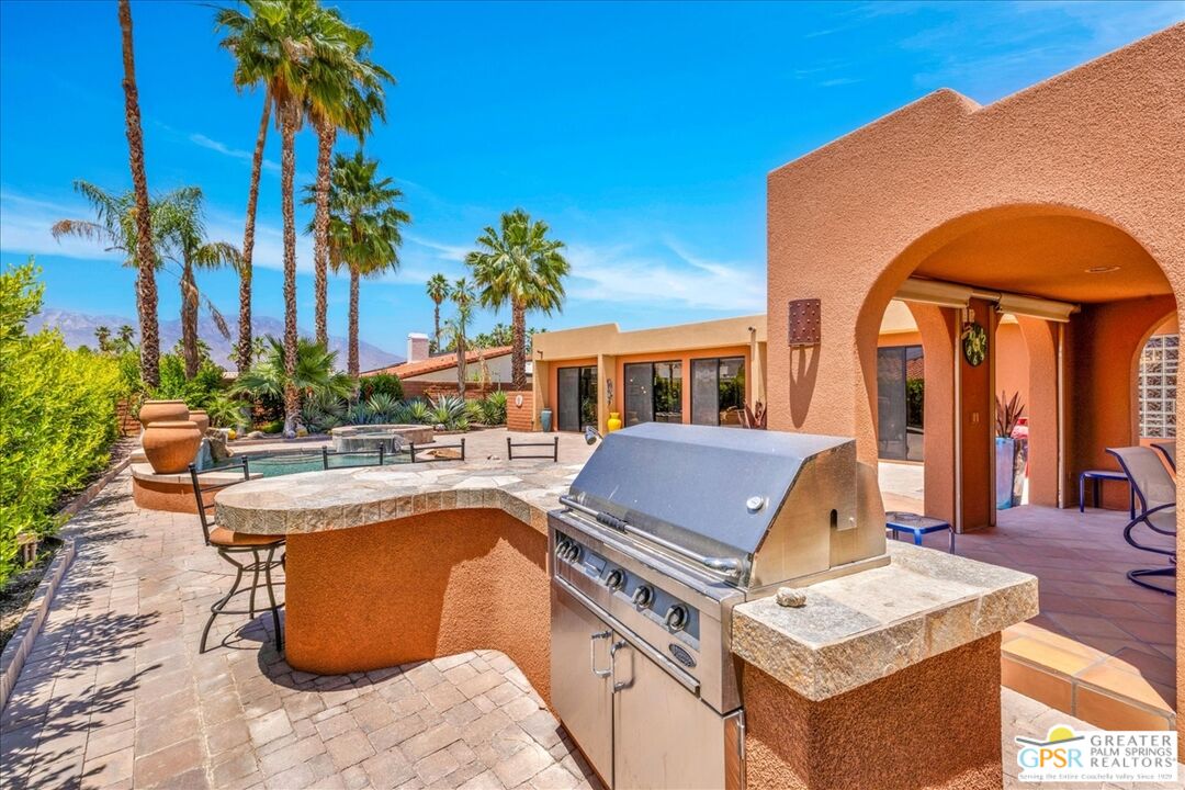 71121 Sunny Lane Rancho Mirage, CA 92270 - Photo 51 of 75 a view of a house with pool and sitting area