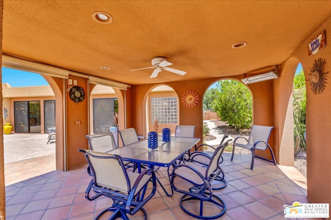 71121 Sunny Lane Rancho Mirage, CA 92270 - Photo 52 of 75 a view of a dining room with furniture and wooden floor