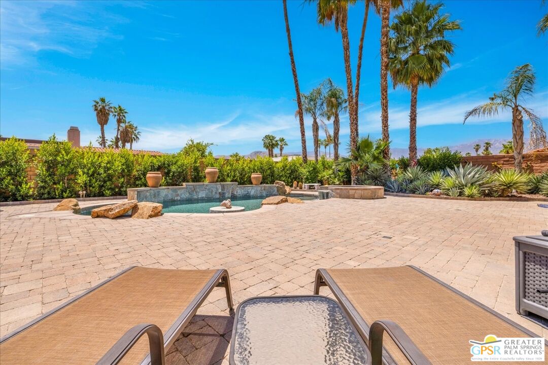 71121 Sunny Lane Rancho Mirage, CA 92270 - Photo 56 of 75 a view of a swimming pool with a patio