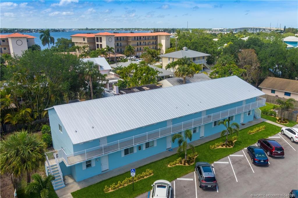 644 Southwest Cleveland Avenue, Unit 6 Stuart, FL 34994 - Photo 13 of 22 an aerial view of a house with a garden