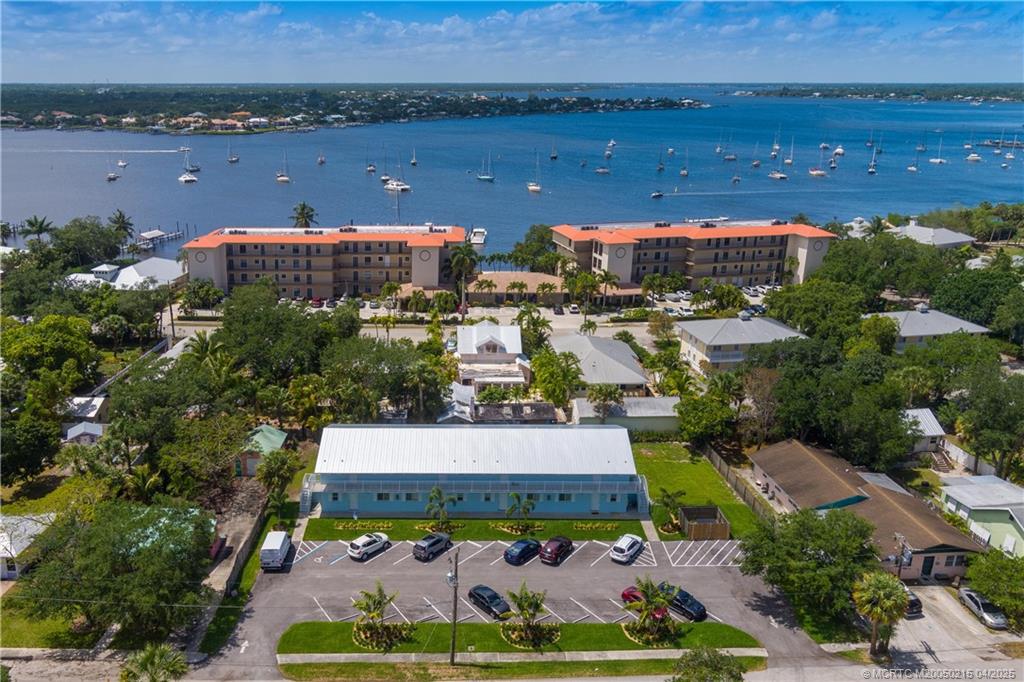 644 Southwest Cleveland Avenue, Unit 6 Stuart, FL 34994 - Photo 4 of 22 an aerial view of a house with a garden and outdoor space