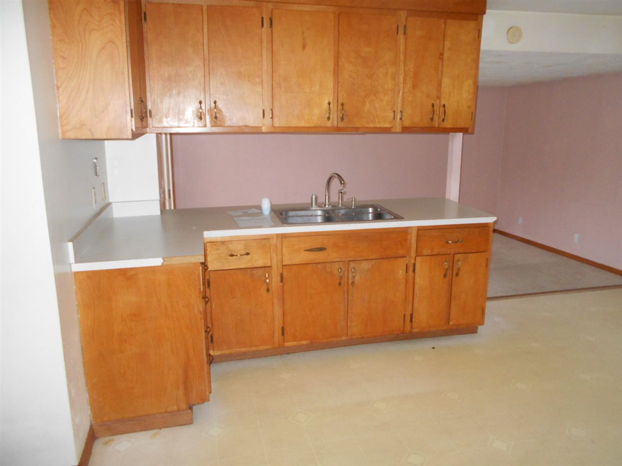 1017 Kenmore Road Rockford, IL 61108 - Photo 3 of 9 a kitchen with stainless steel appliances granite countertop a sink and a cabinets