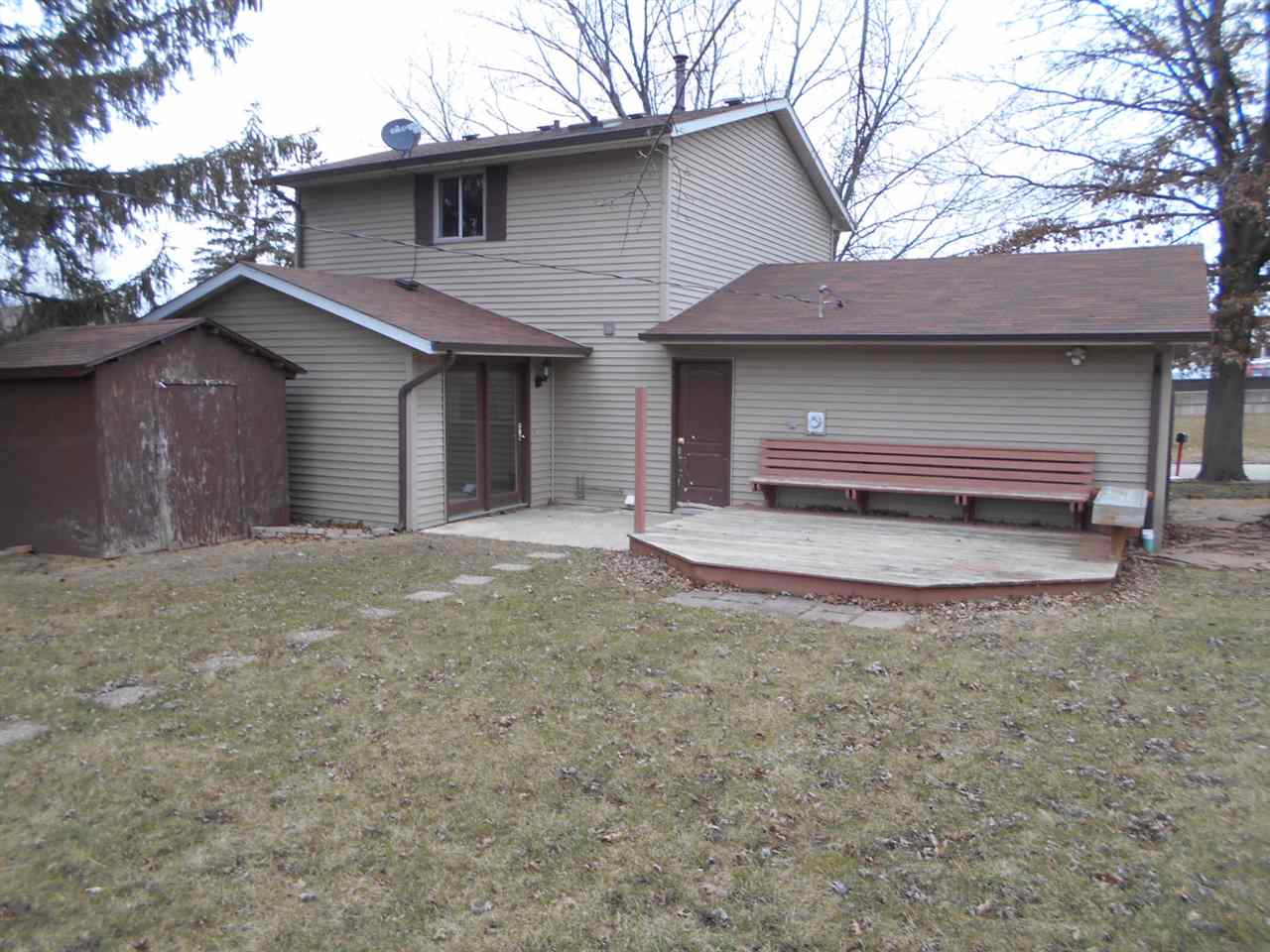 1017 Kenmore Road Rockford, IL 61108 - Photo 9 of 9 a view of a house with a yard and garage