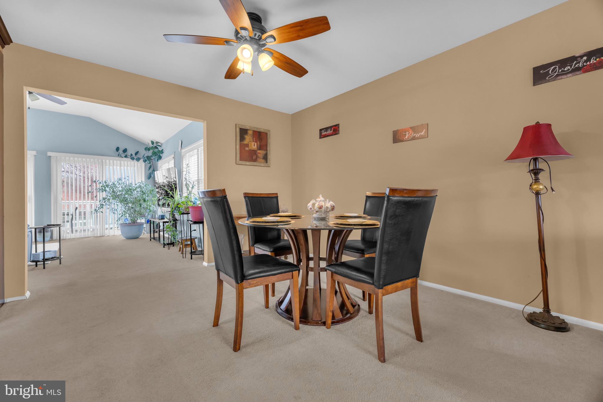 1902 Juniper Road Edgewood, MD 21040 - Photo 12 of 36 a dining room with furniture and a chandelier