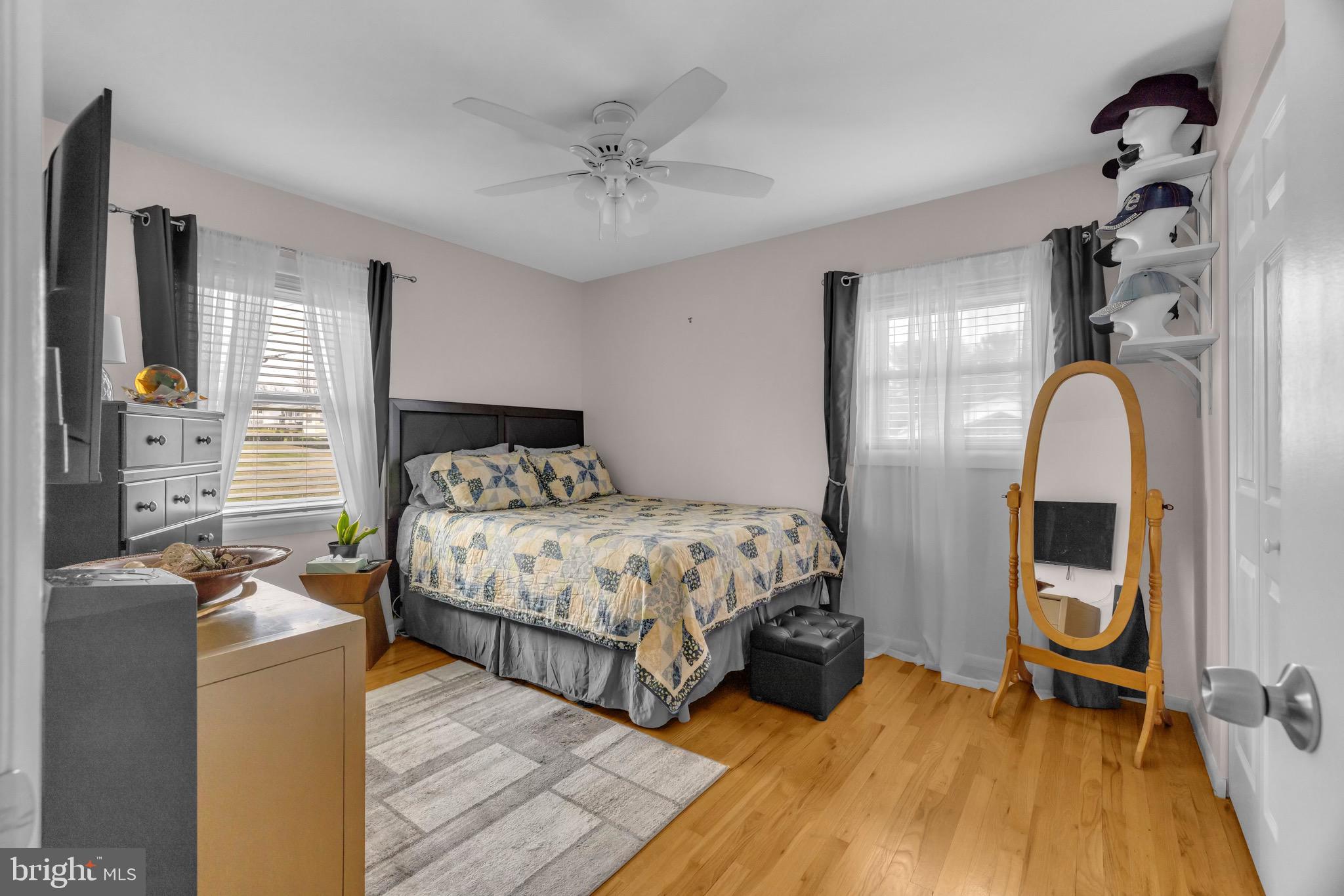 1902 Juniper Road Edgewood, MD 21040 - Photo 18 of 36 a bedroom with a bed and a mirror