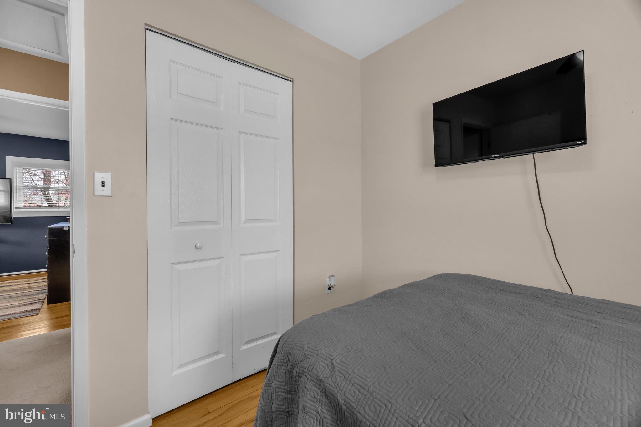 1902 Juniper Road Edgewood, MD 21040 - Photo 20 of 36 a bedroom with a bed and a flat screen tv