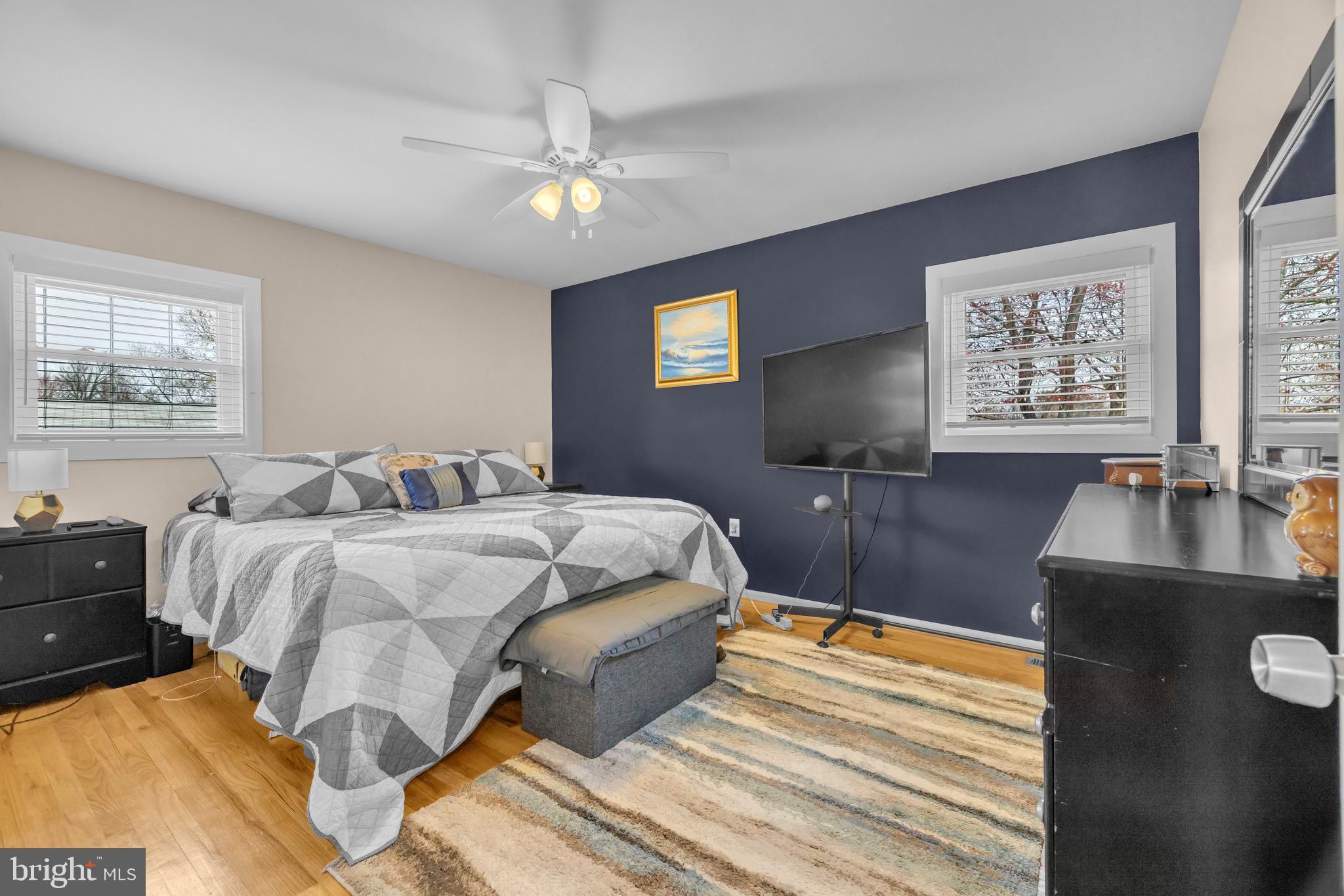 1902 Juniper Road Edgewood, MD 21040 - Photo 21 of 36 a bedroom with a bed and a flat screen tv