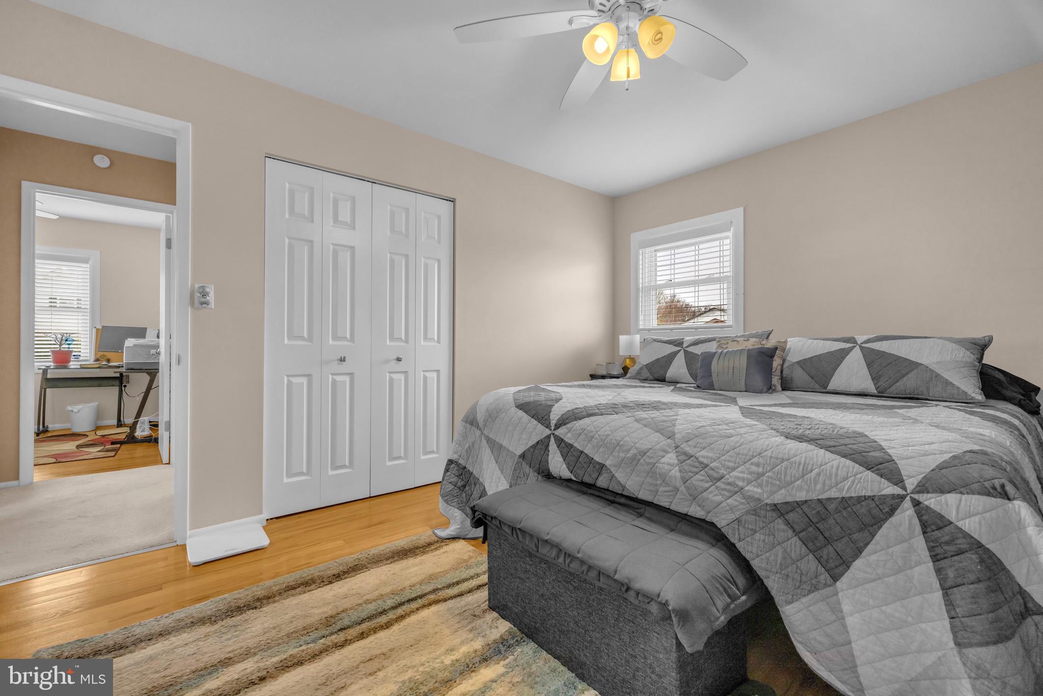 1902 Juniper Road Edgewood, MD 21040 - Photo 22 of 36 a bedroom with a bed and a chandelier