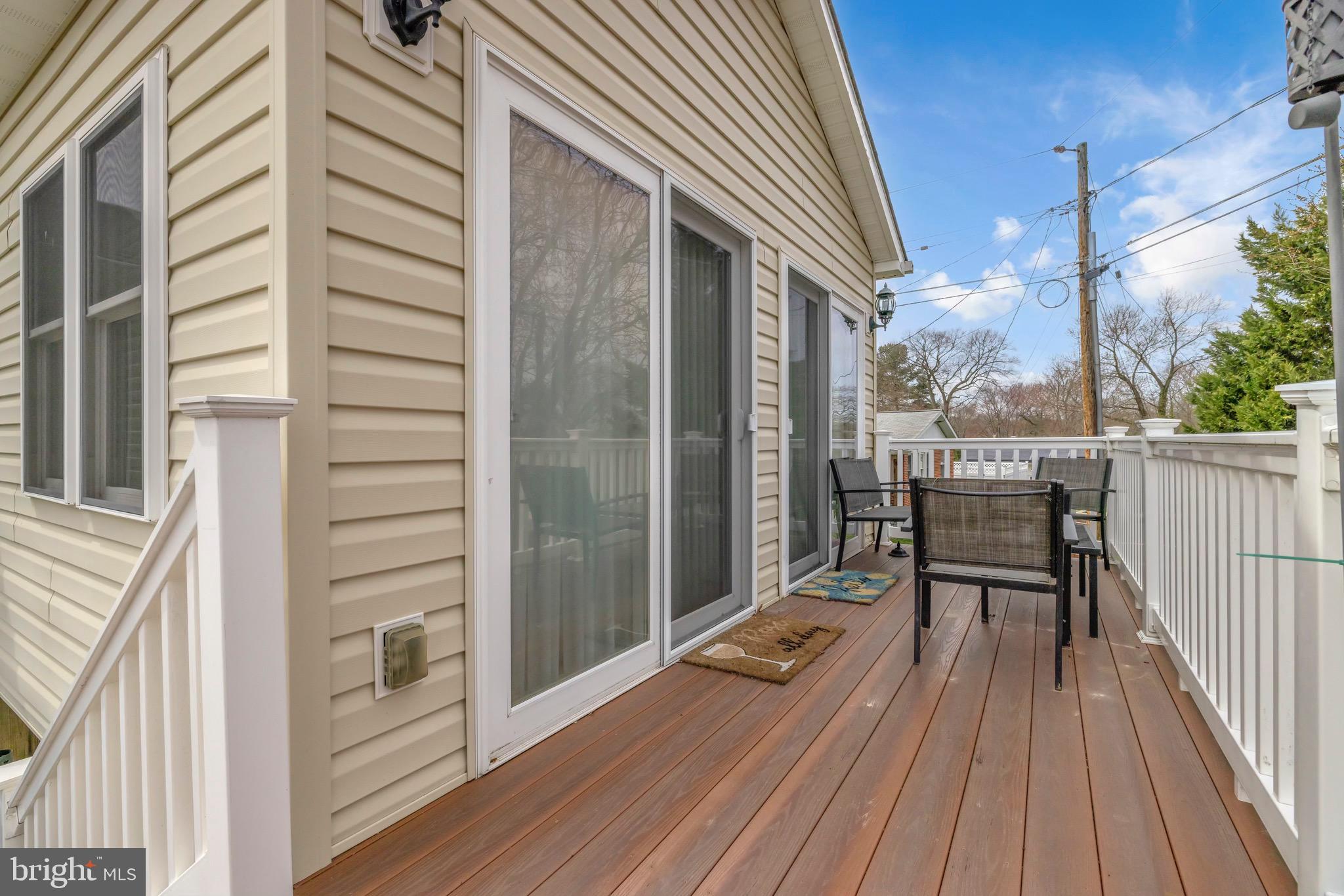 1902 Juniper Road Edgewood, MD 21040 - Photo 31 of 36 a balcony with furniture and wooden floor
