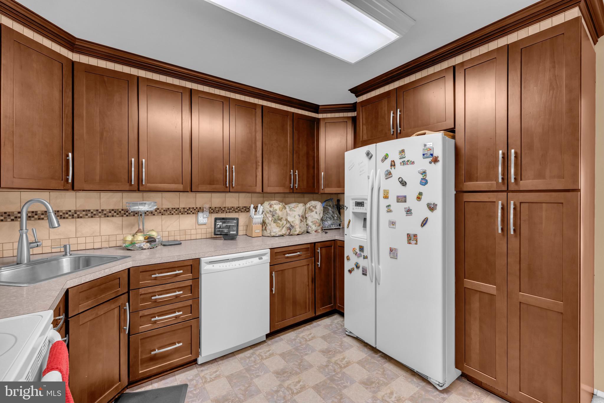 1902 Juniper Road Edgewood, MD 21040 - Photo 9 of 36 a kitchen with stainless steel appliances granite countertop a refrigerator and a stove top oven