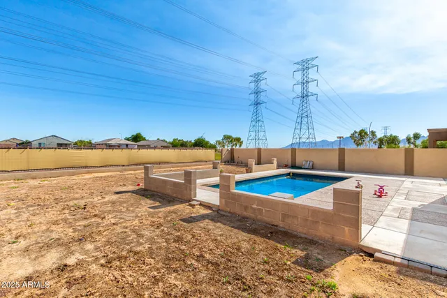 a view of a lake with couches and city view