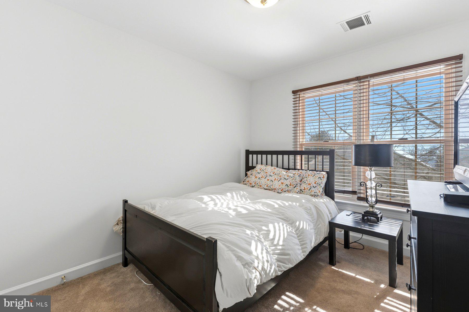 3632 Ransom Place Alexandria, VA 22306 - Photo 19 of 33 a bedroom with a bed and a window