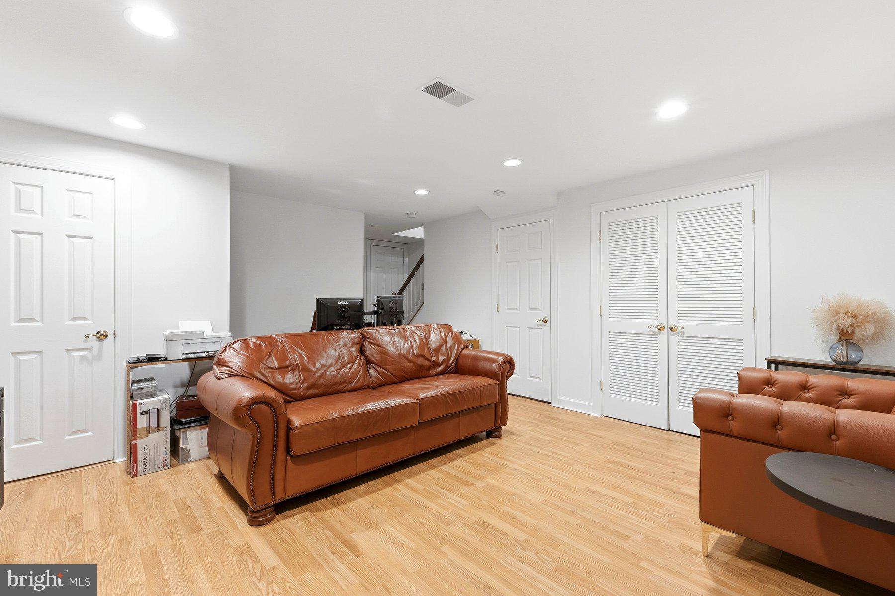 3632 Ransom Place Alexandria, VA 22306 - Photo 25 of 33 a living room with furniture and a wooden floor