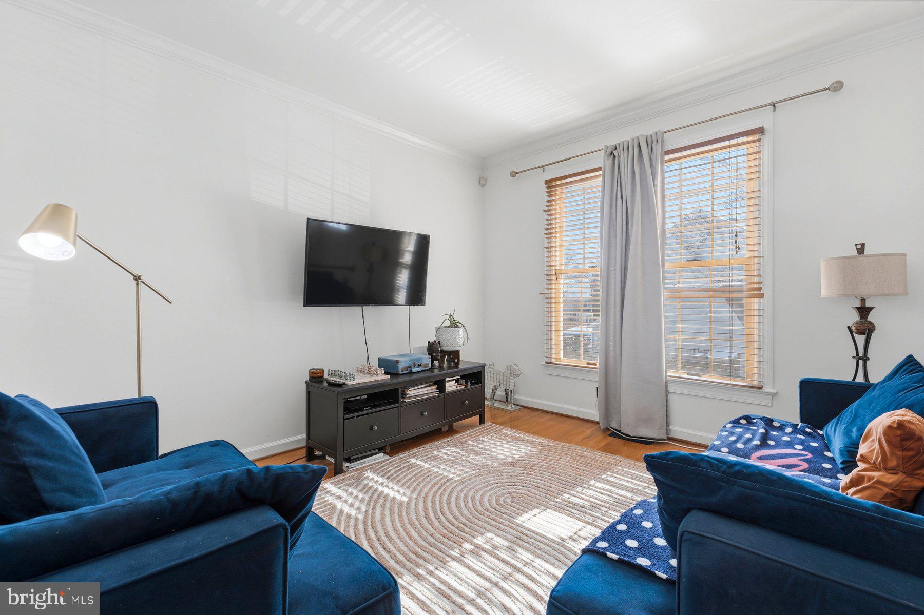 3632 Ransom Place Alexandria, VA 22306 - Photo 3 of 33 a living room with furniture and a flat screen tv