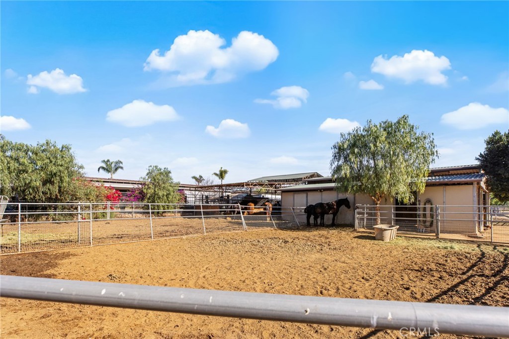 3243 Temescal Avenue Norco, CA 92860 - Photo 16 of 52 a view of a swimming pool with outdoor seating