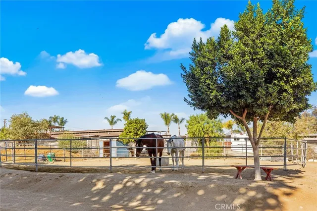 an aerial view of residential building with parking