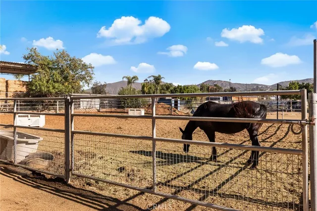 an aerial view of residential houses with city view