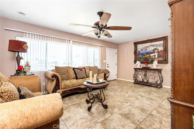 a kitchen with granite countertop cabinets a dining table and chairs