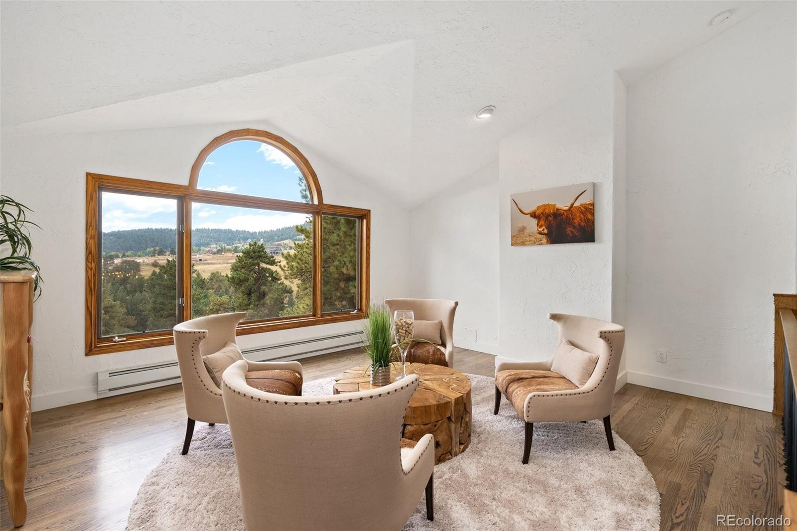 24140 Highway 40 Golden, CO 80401 - Photo 14 of 40 a living room with furniture and a window