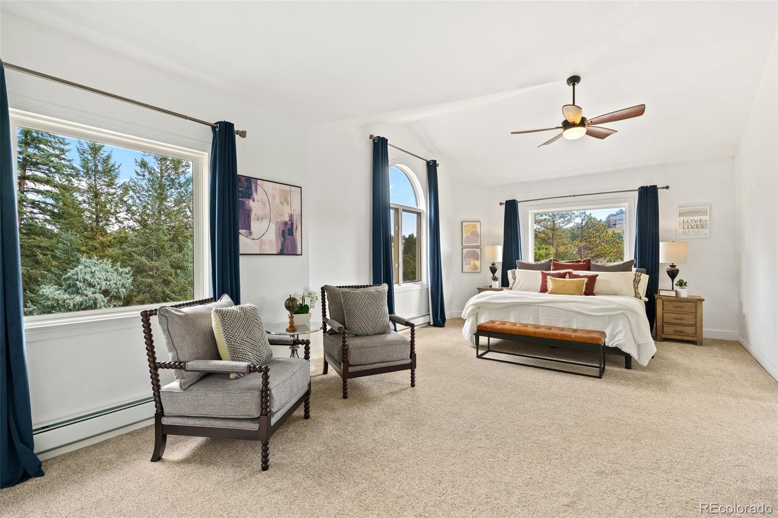 24140 Highway 40 Golden, CO 80401 - Photo 21 of 40 a bedroom with a bed and a couch