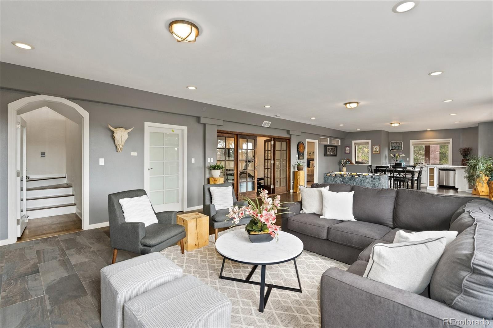 24140 Highway 40 Golden, CO 80401 - Photo 24 of 40 a living room with furniture and wooden floor