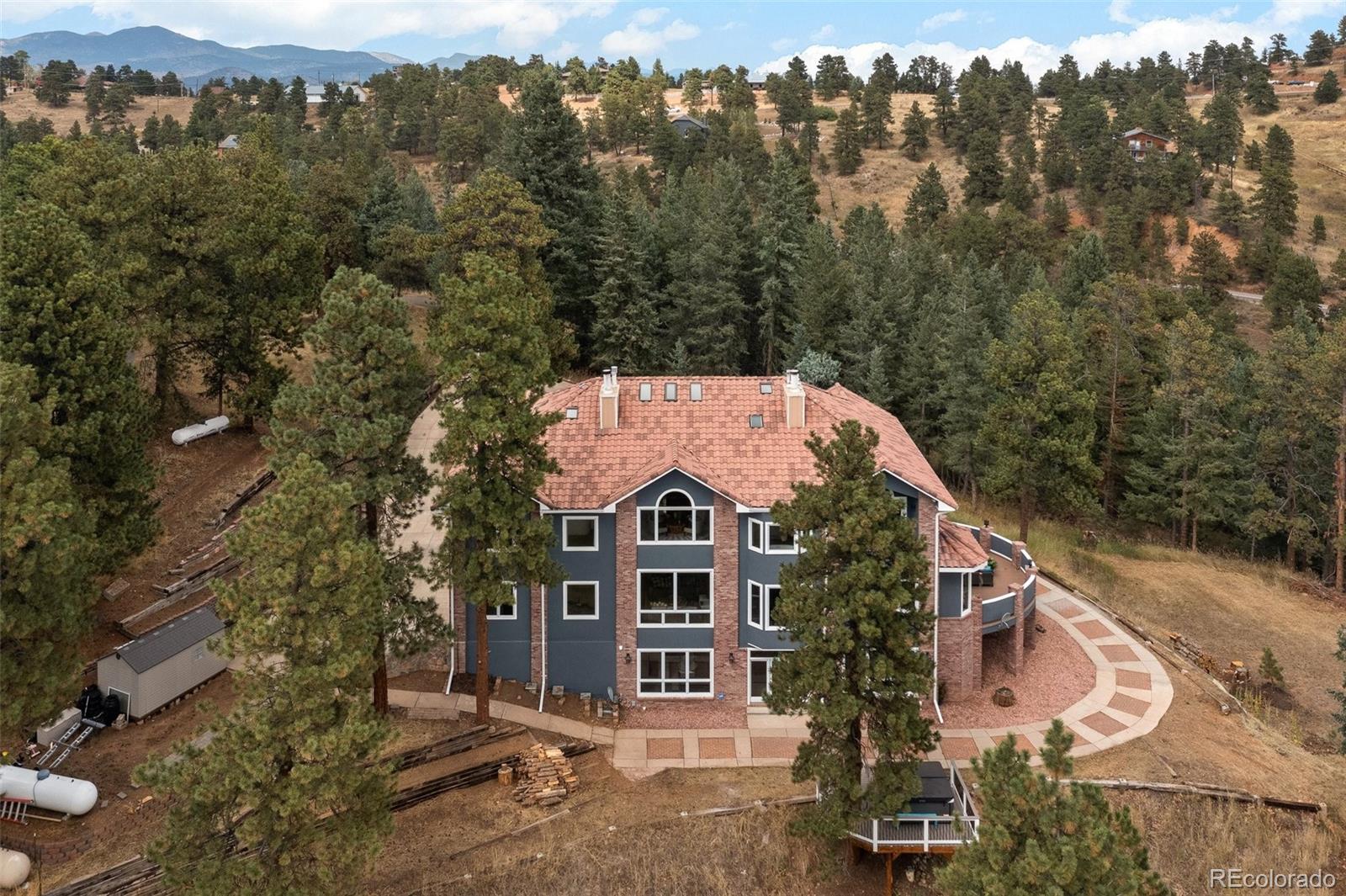 24140 Highway 40 Golden, CO 80401 - Photo 3 of 40 an aerial view of a house with a yard